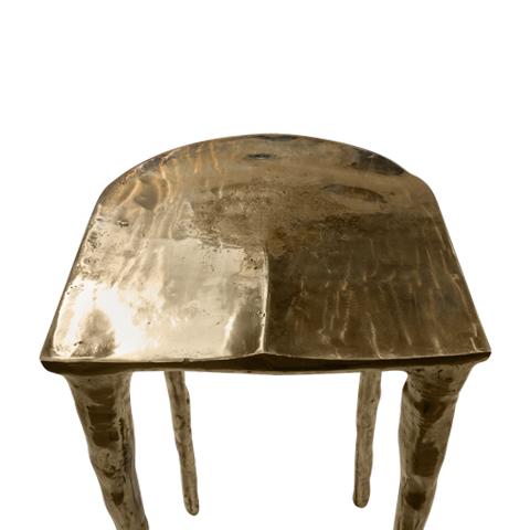 bar stool made of brass