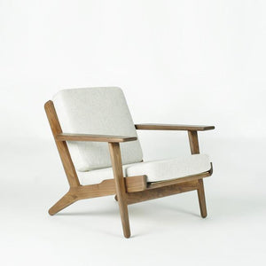 white wooden lounge chair